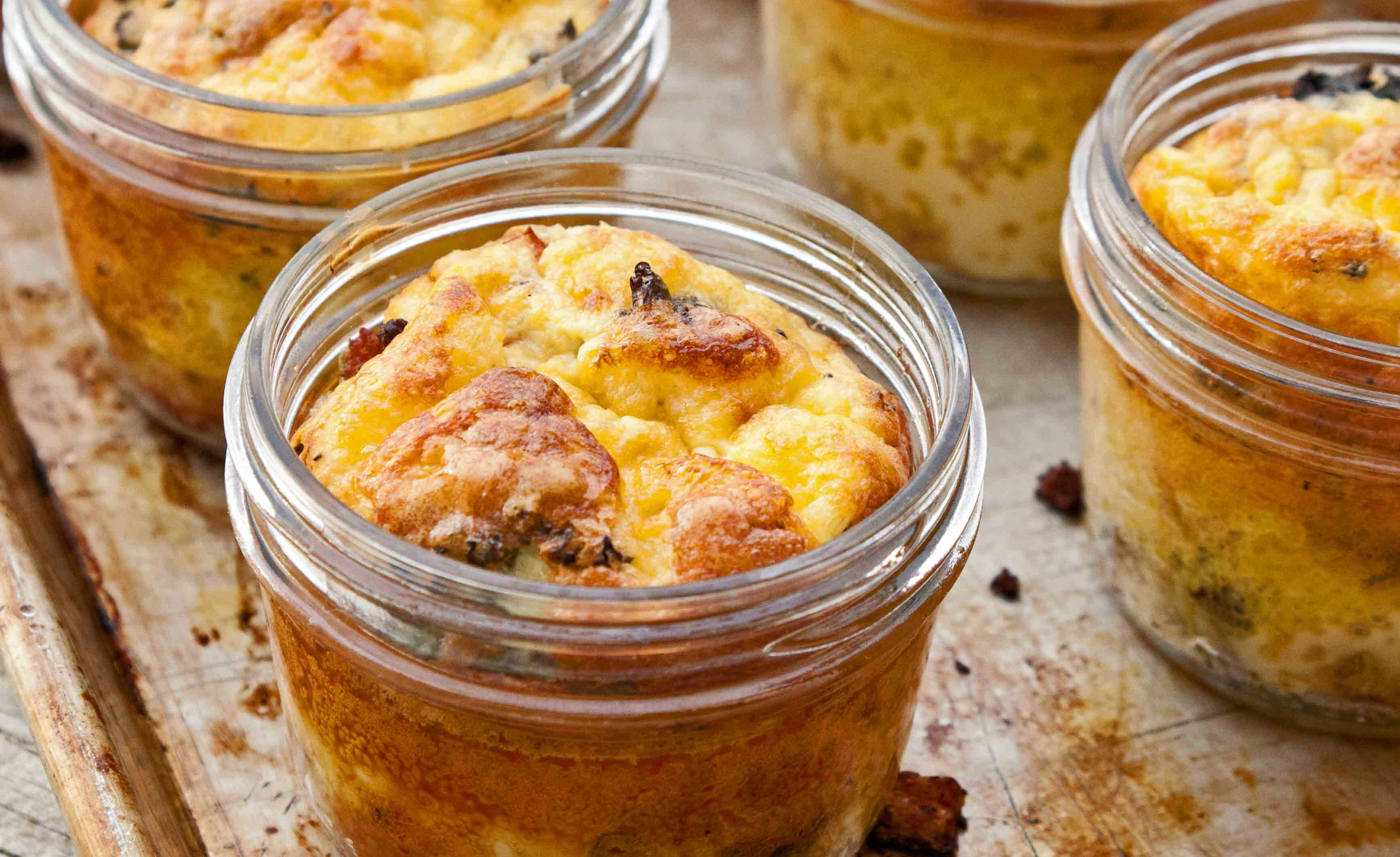 http://foodinjars.com/2011/05/breakfast-baked-eggs-in-half-pint-jars/