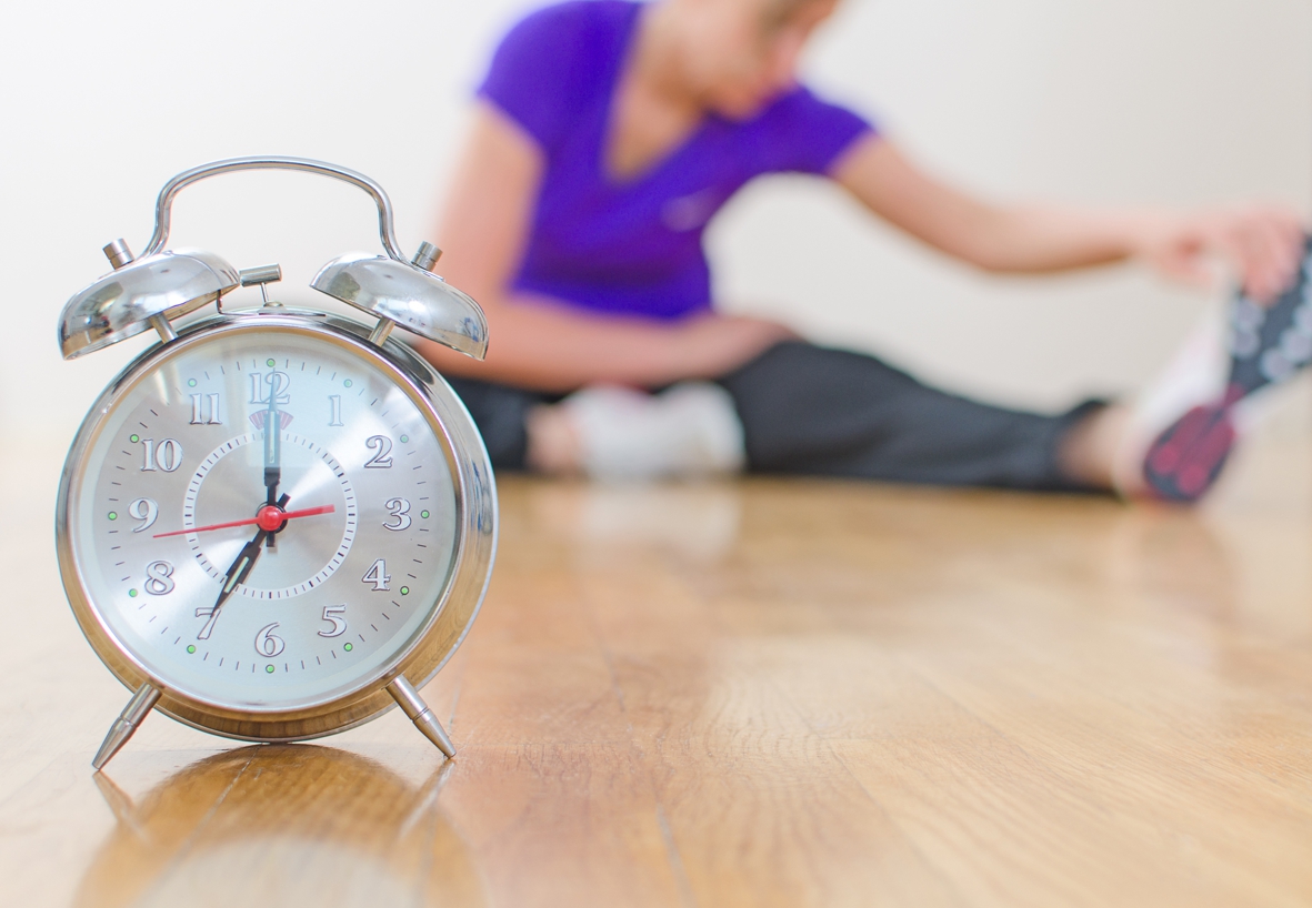 Horario del día.  Mujer haciendo deporte.